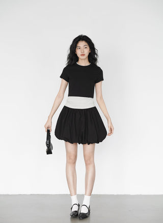 black mini skirt