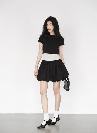 black mini skirt