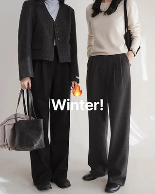 Leg-lengthening pintuck wide slacks