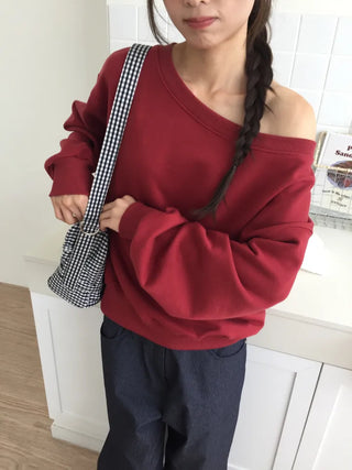 Delicate fit effortless chic off-shoulder sweatshirt