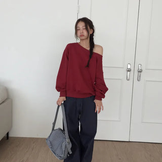 Delicate fit effortless chic off-shoulder sweatshirt