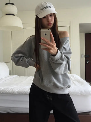 Delicate fit effortless chic off-shoulder sweatshirt