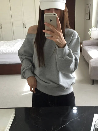 Delicate fit effortless chic off-shoulder sweatshirt