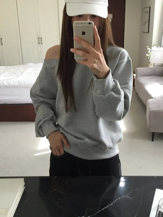 Delicate fit effortless chic off-shoulder sweatshirt