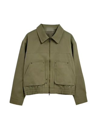 Black loose-fit jacket that accentuates a delicate silhouette