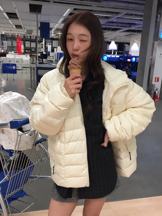Lightweight, warm  Loose-fit lightweight padded jacket