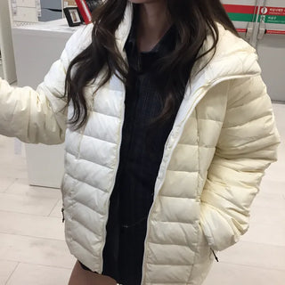Lightweight, warm  Loose-fit lightweight padded jacket