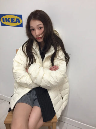 Lightweight, warm  Loose-fit lightweight padded jacket