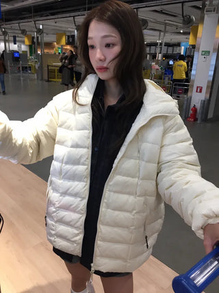 Lightweight, warm  Loose-fit lightweight padded jacket