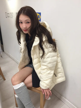 Lightweight, warm  Loose-fit lightweight padded jacket