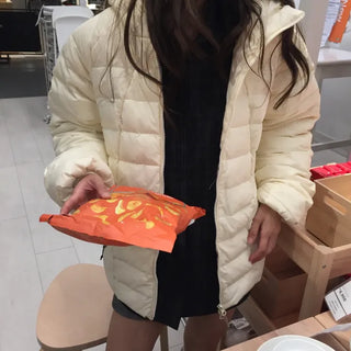 Lightweight, warm  Loose-fit lightweight padded jacket