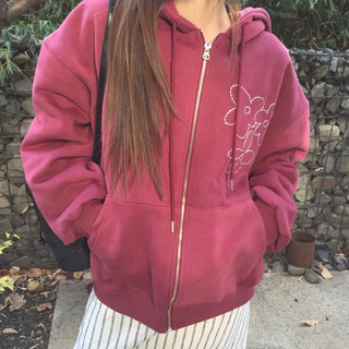 Red hoodie that brightens up your face with floral embroidery details