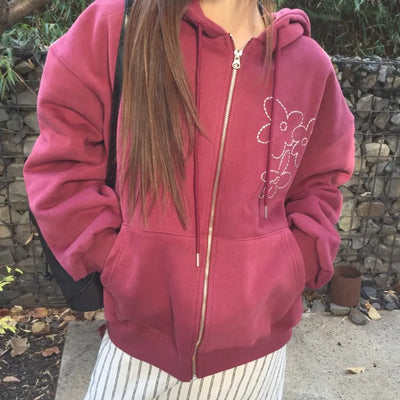 Red hoodie that brightens up your face with floral embroidery details