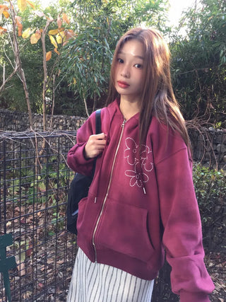Red hoodie that brightens up your face with floral embroidery details