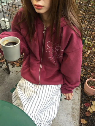 Red hoodie that brightens up your face with floral embroidery details