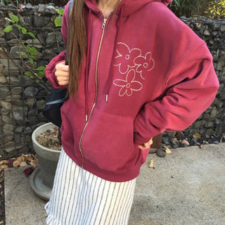 Red hoodie that brightens up your face with floral embroidery details