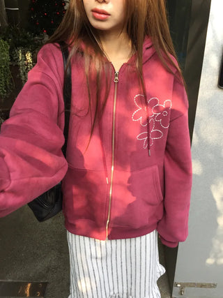 Red hoodie that brightens up your face with floral embroidery details
