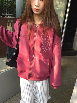Red hoodie that brightens up your face with floral embroidery details