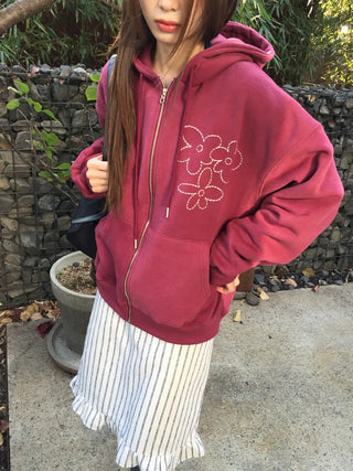 Red hoodie that brightens up your face with floral embroidery details