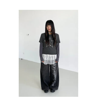 washed denim trousers
