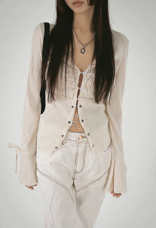 Blouse with corset eyelet straps and pleated blouse