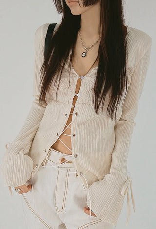 Blouse with corset eyelet straps and pleated blouse