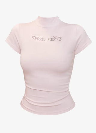 Pink short sleeved T shirt with spangle lettering
