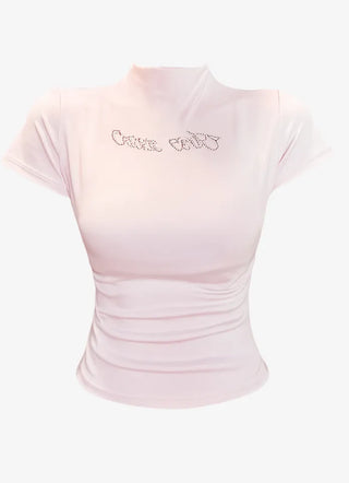 Pink short sleeved T shirt with spangle lettering