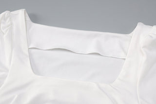 Long sleeved pleated dress