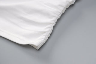 Long sleeved pleated dress