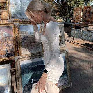 Long sleeved pleated dress