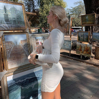 Long sleeved pleated dress