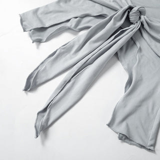 irregular revealing top