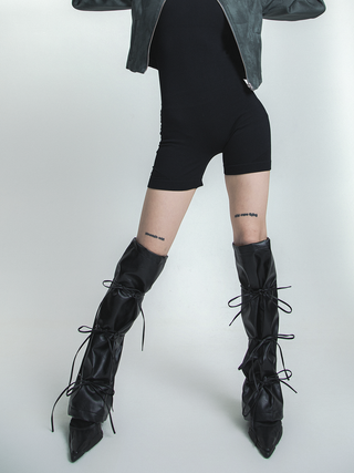 Leather bow legwarmers