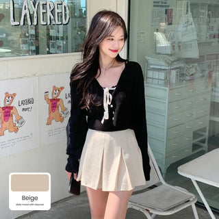 Tweed pleated mini skirt