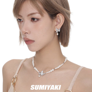 Twin butterfly earrings