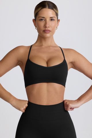 Super Sculpt Seamless Cross-Back Sports Bra in Black