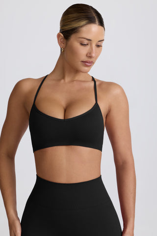 Super Sculpt Seamless Cross-Back Sports Bra in Black