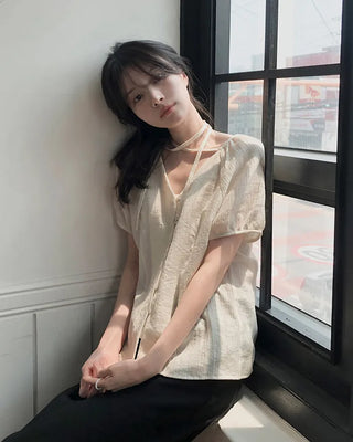 Strappy short-sleeved blouse