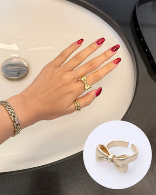 Ribbon motif ring