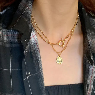 Layered buckle necklace