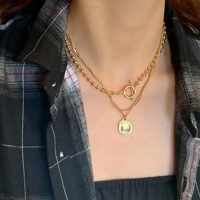 Layered buckle necklace