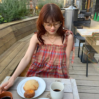 Checked sleeveless blouse