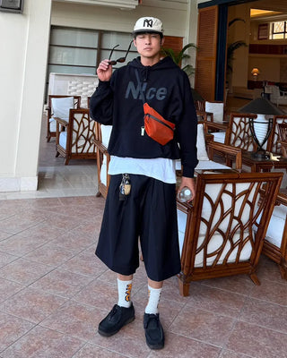 Double-pleated Bermuda shorts