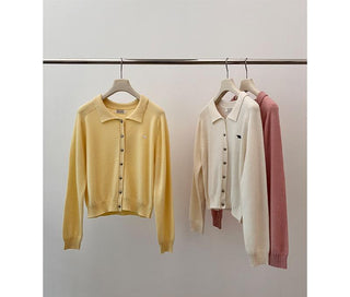 brass buckle sweater