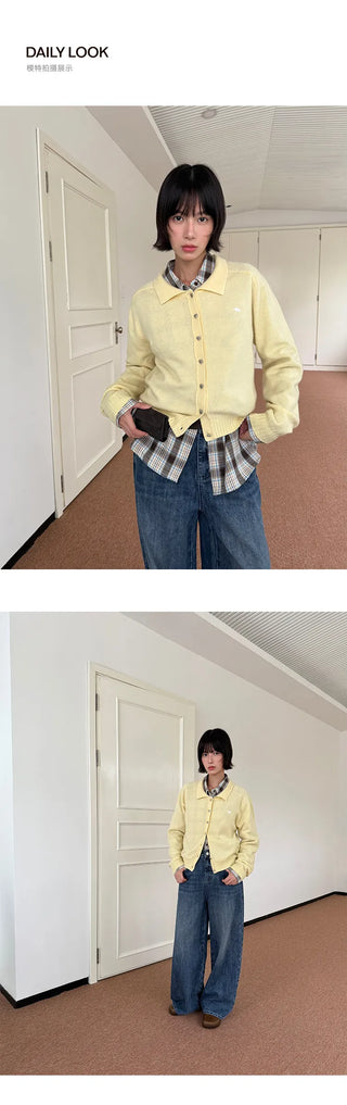 brass buckle sweater