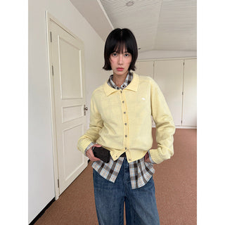 brass buckle sweater