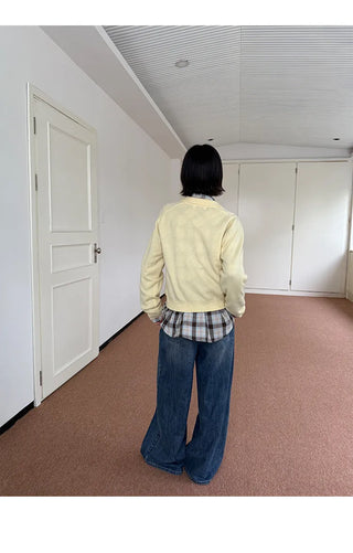 brass buckle sweater