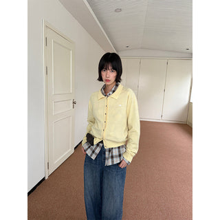 brass buckle sweater