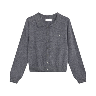 brass buckle sweater